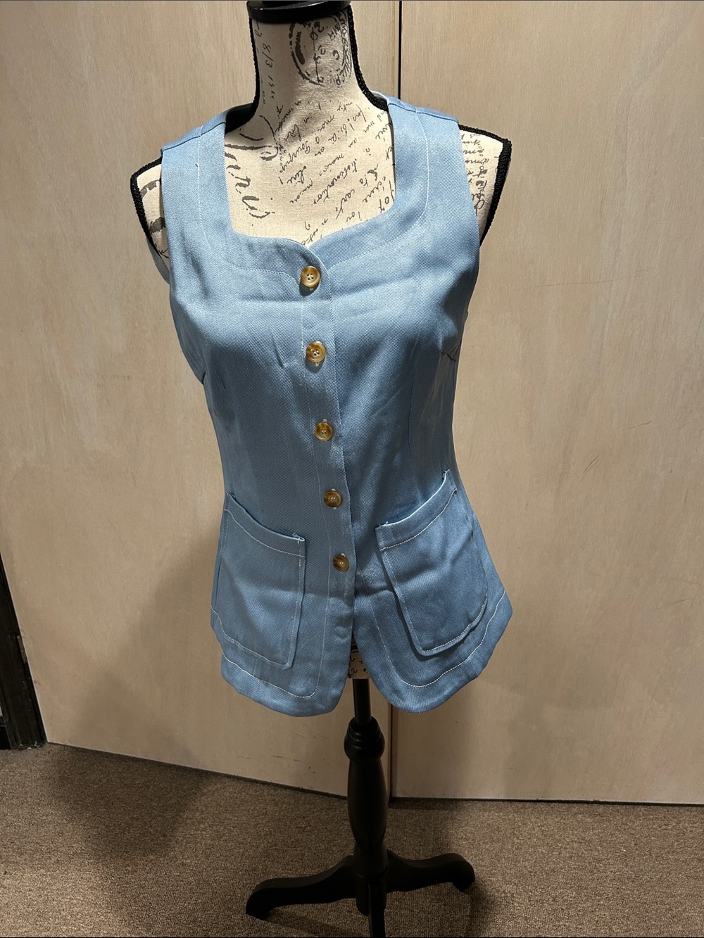 Sleeveless Light Blue Button-Front Vest with Patch Pockets